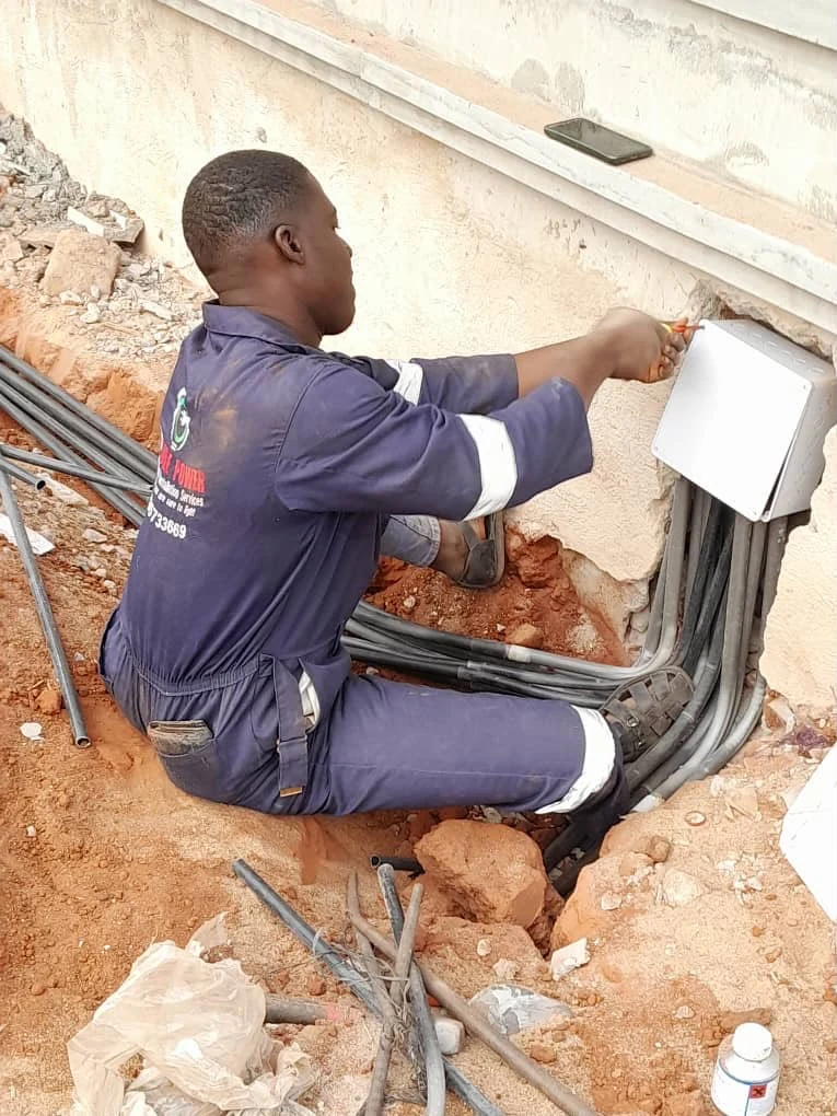 Technician working on an electrical cable installation